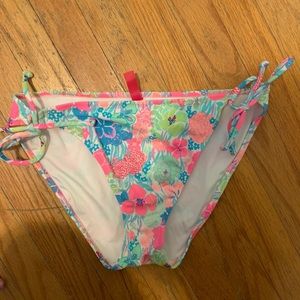 Floral Victoria’s Secret swim bottoms.